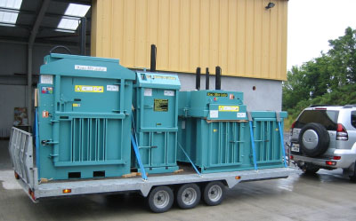 Balers loaded for delivery. 